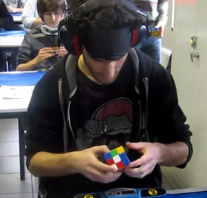 New-Rubiks-Cube-Solving-Record-While-BlindFolded-WCA-2012-Marcell-Endrey-300x287